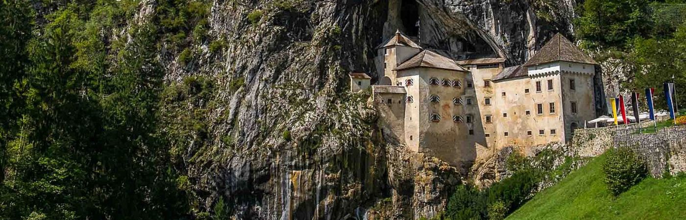 This Castle Was Carved Into a Cliffside. Here's The Story Of Predjama Castle.